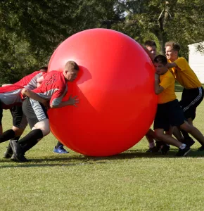 Sports team using a Mega Ball for a game