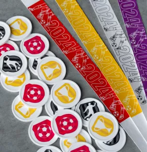 Pre-printed Tyvek wristbands and Plastic Tokens with football designs