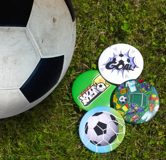 Round buttons with football designs