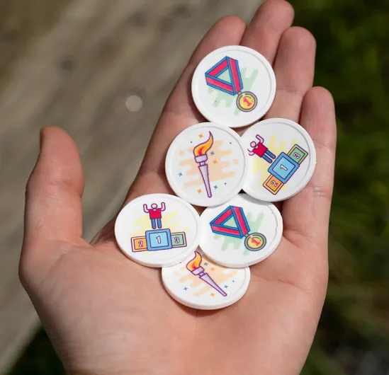 Plastic Tokens with pre-printed designs for the Olympics